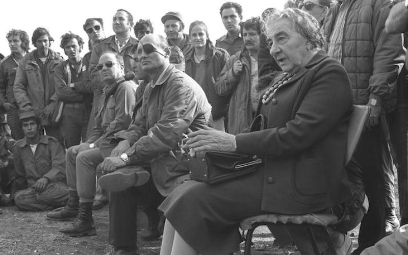 Prime Minister Golda Meir shaking hands with the C.O.S. Haim Bar Lev, standing between Supreme Court Justice Agranat & Defence Minister Moshe Dayan befor departure for USA, at Lod, 24.09.1969